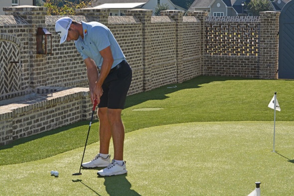 Las Vegas Golfer putting on synthetic grass